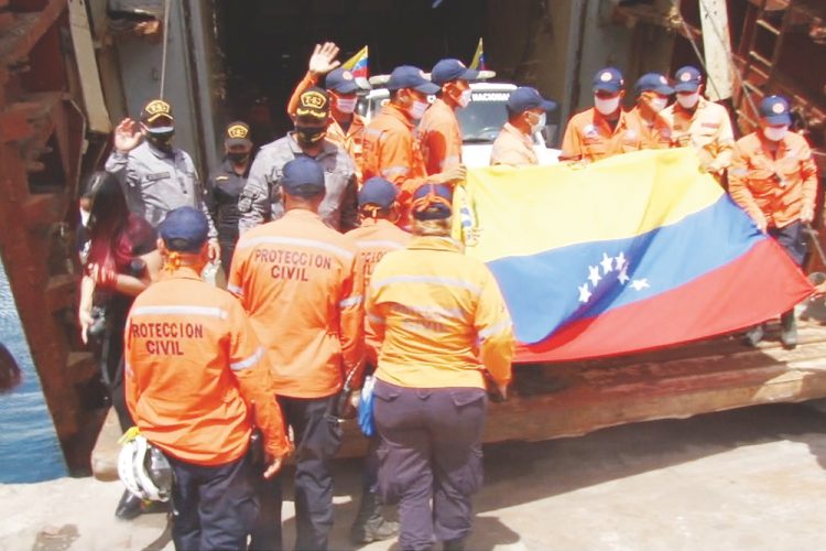 Venezuelan  humanitarian task force  returns home