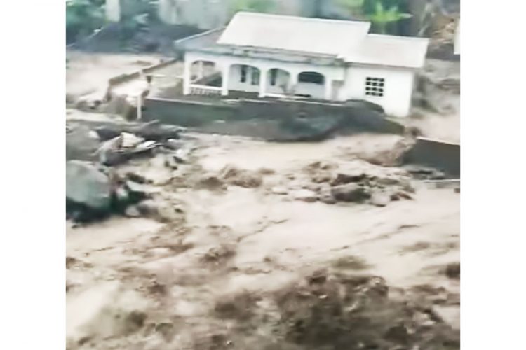 Volcano ravaged villages swamped by heavy rains