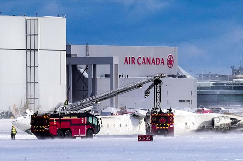 Delta Airlines flight crash lands at Toronto Pearson Airport Searchlight